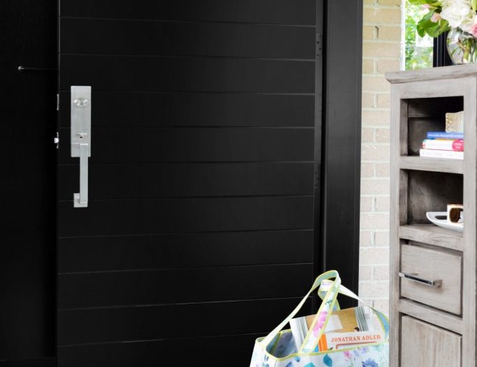 modern-black-entry-door-fieldstone-windows-doors