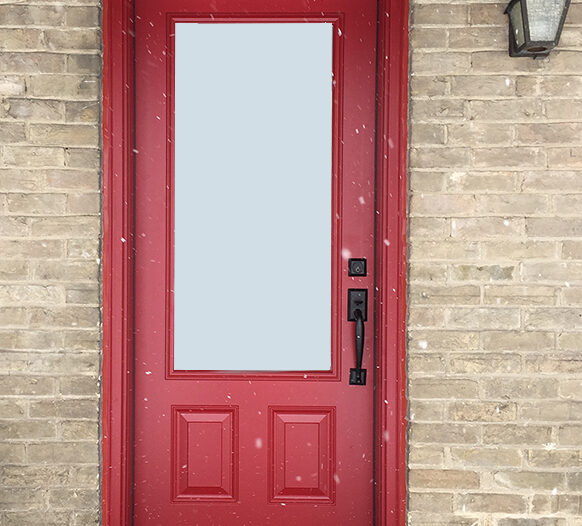 Red smooth fiberglass entry door installed in a Uxbridge home
