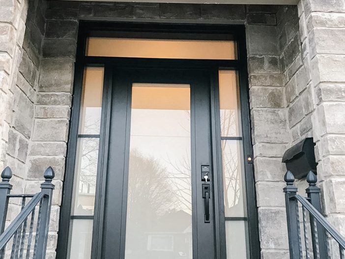 Smooth fiberglass black entry door