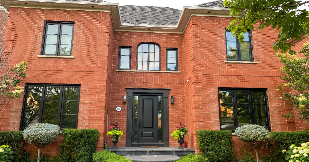 Vinyl Casement Windows in Black (before/after) Unionville