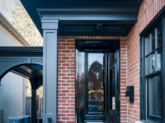 High-gloss black fiberglass entry door