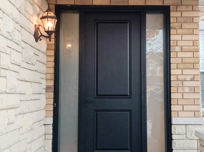 Black smooth fiberglass door with direct set sidelights on each side