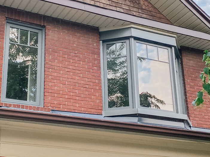 Vinyl bay window in a slate color installed in a Toronto home