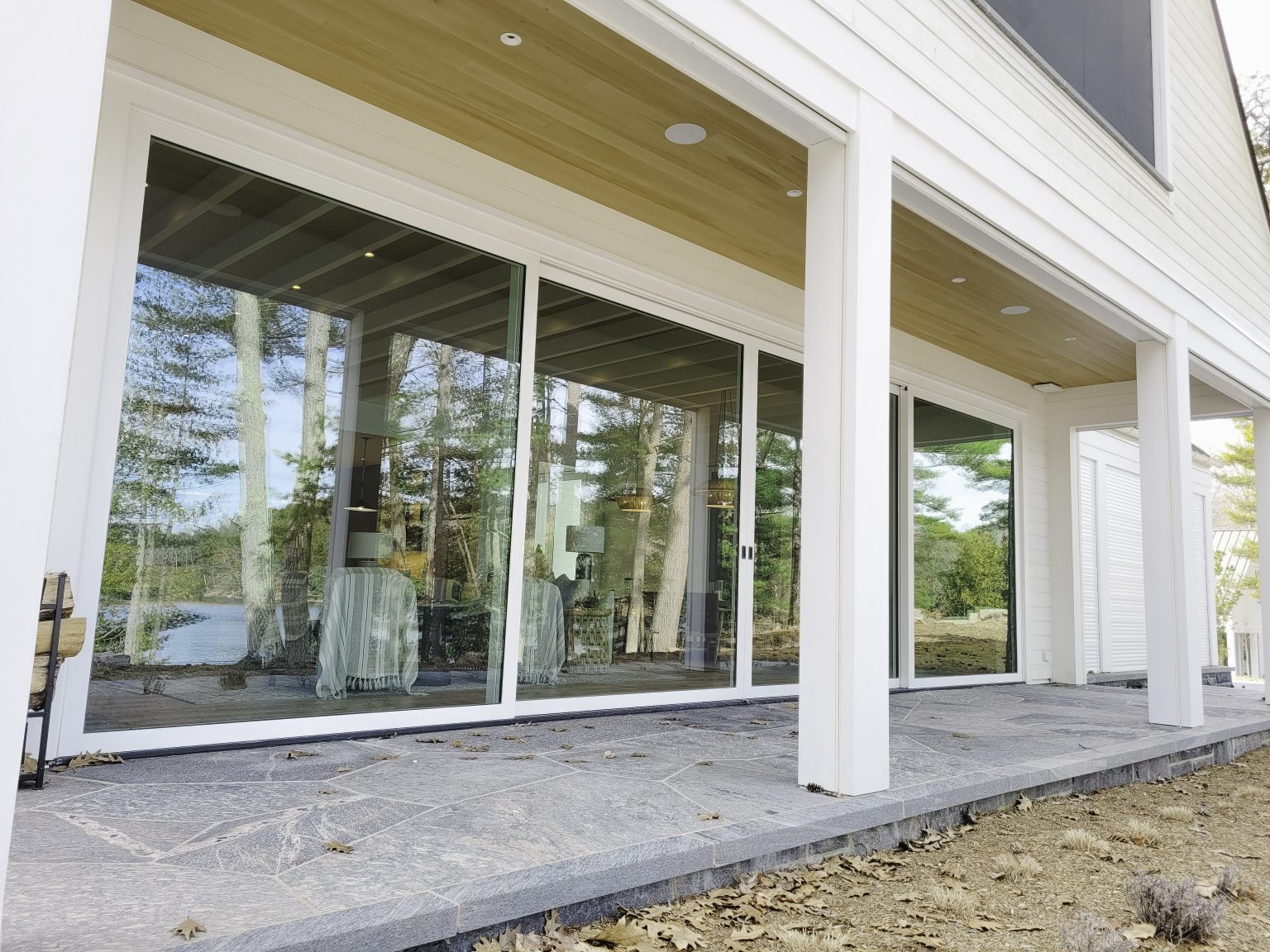 Loewen Lift & Slide Doors inside a Curtain Wall Window System