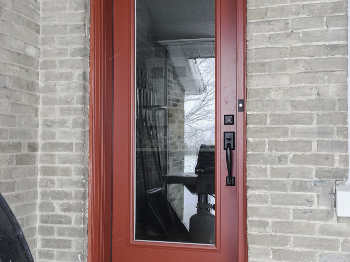 Full glass fiberglass kitchen door installed in a Uxbridge home