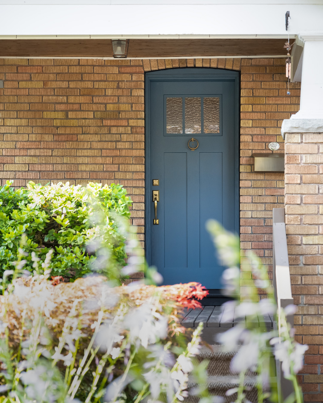 fiberglass craftsman style door with two vertical shaker panels exterior