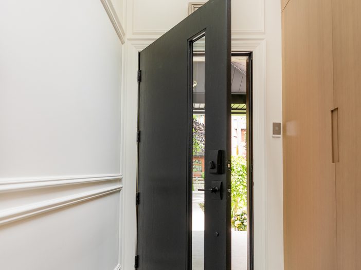oak grain fiberglass entry door open door inside