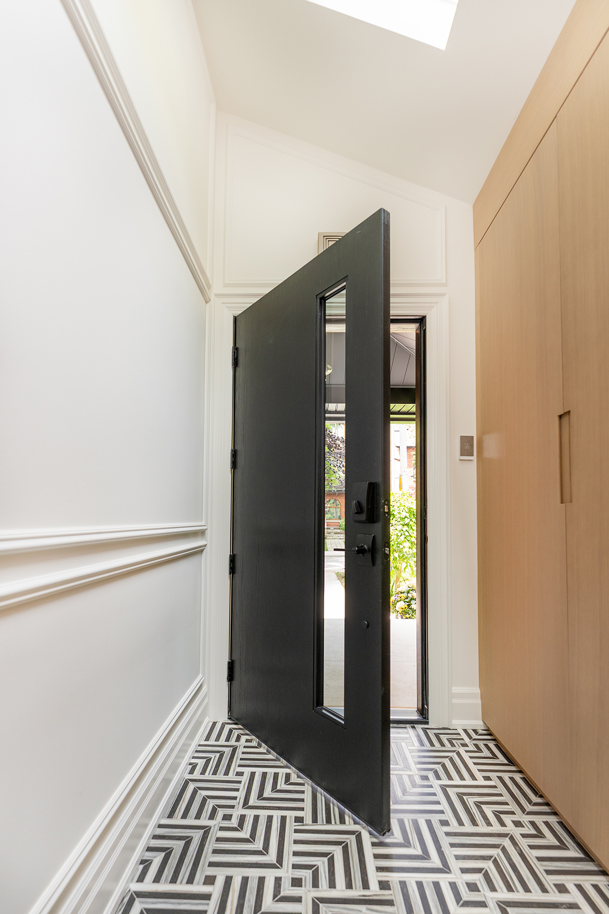 oak grain fiberglass entry door open door inside