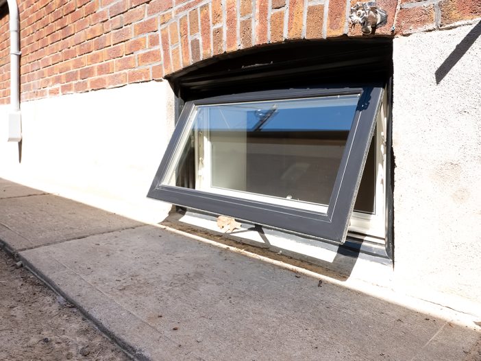 Vinyl Awning Basement Windows exterior view