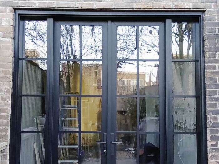 black fiberglass rail and stile double doors
