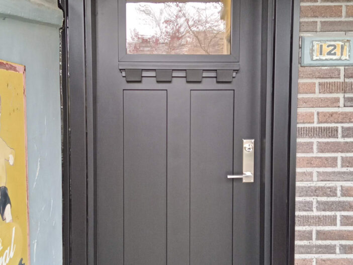 Smooth fiberglass Craftsman-style front door installed in Toronto