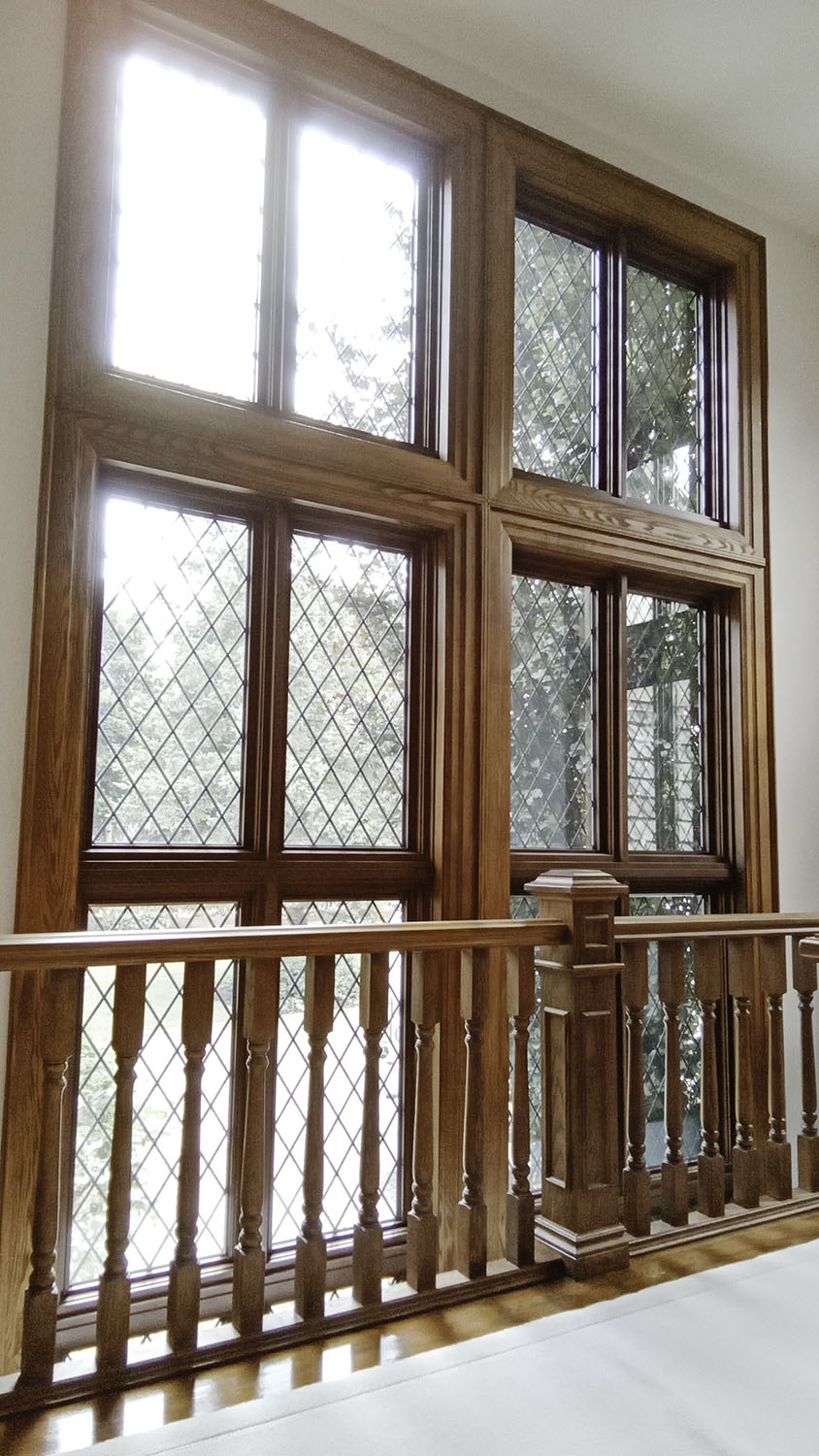 tall fixed casement window with leaded tape