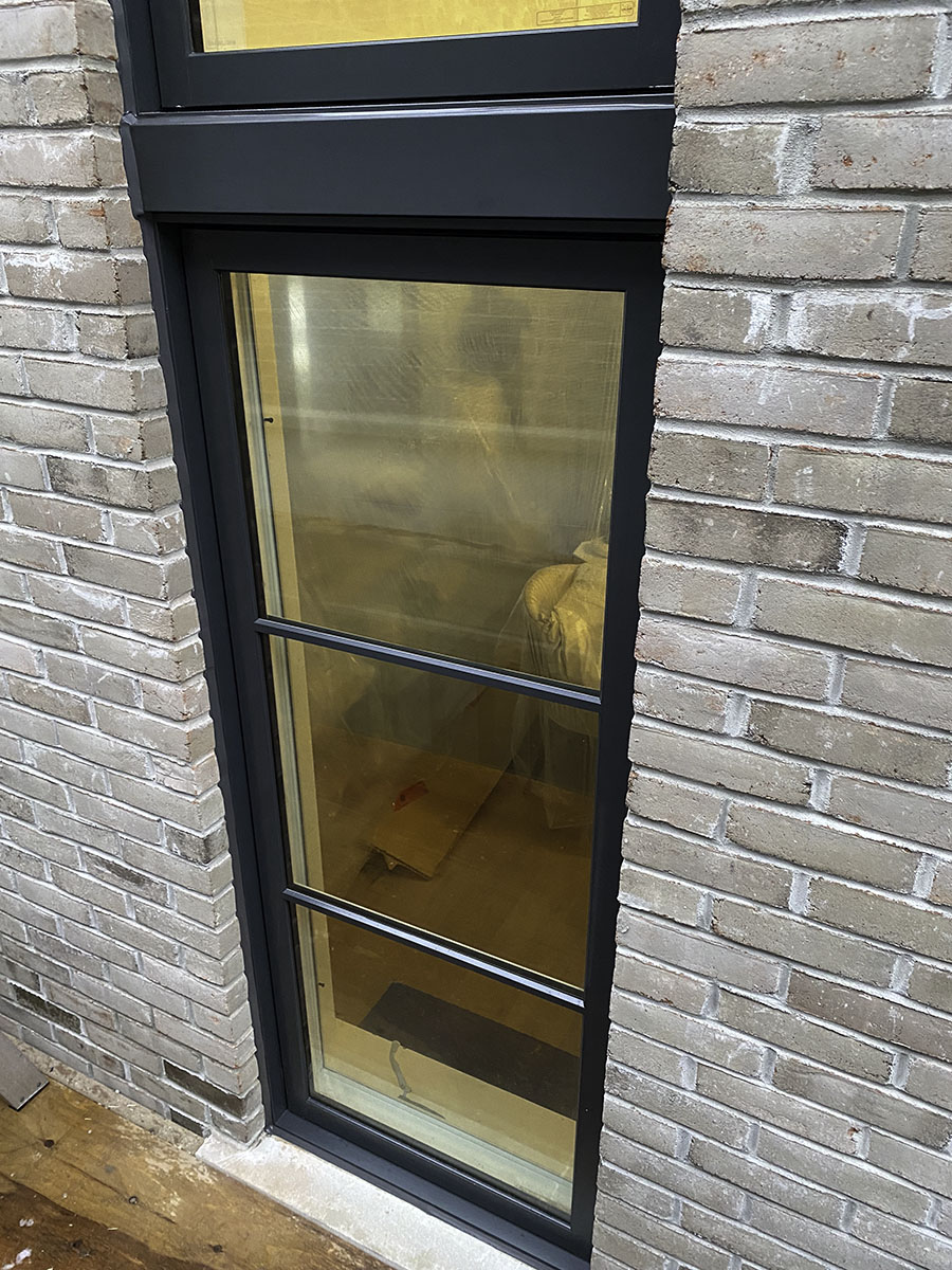 Wood Windows with Iron Ore Aluminum Cladding & Colonial Grilles - close up