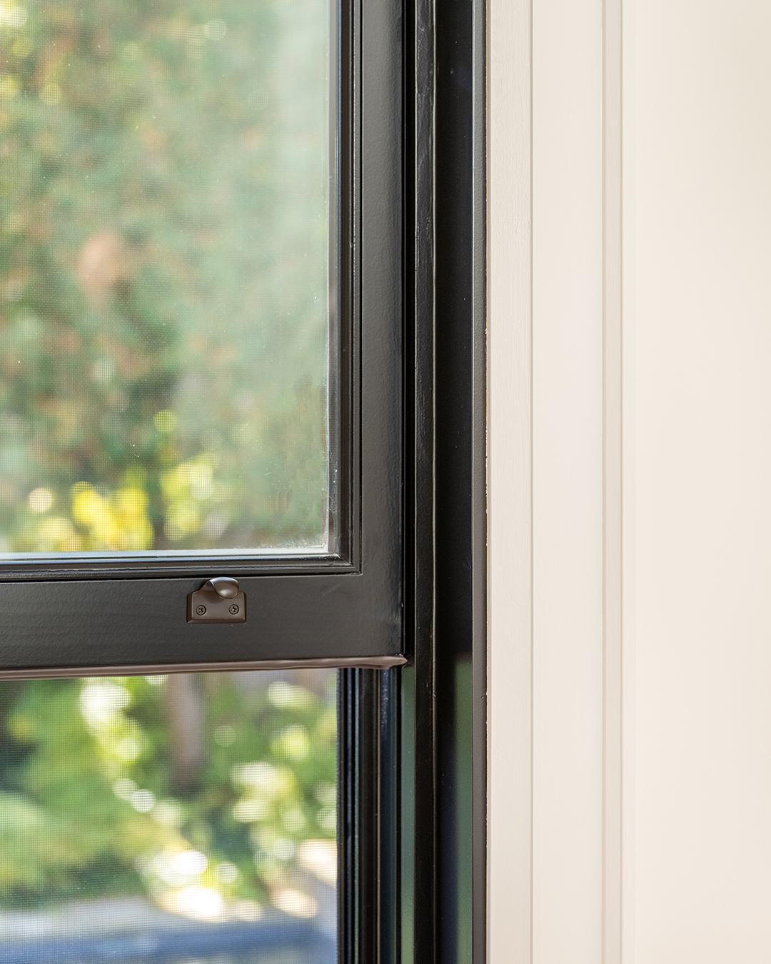 black single hung metal clad windows - open window