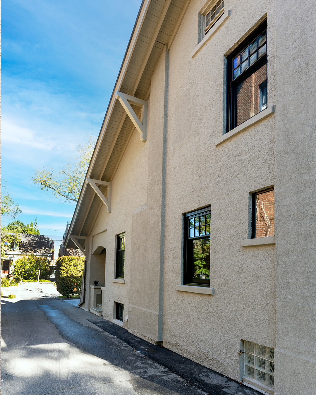 black single hung metal clad windows - side exterior
