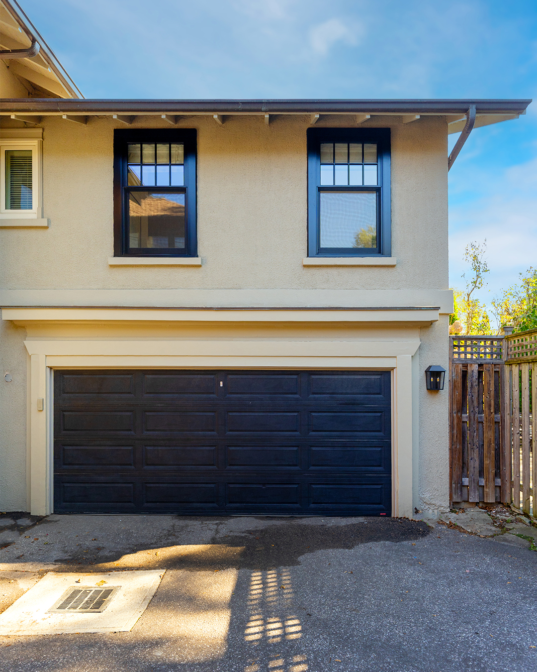 black single hung metal clad windows - garage front view