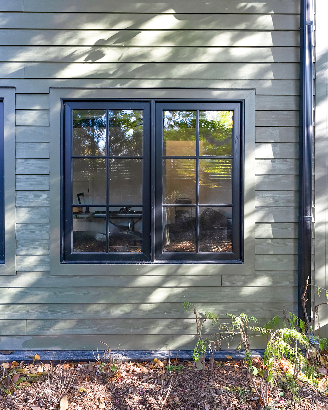 Modern garden suite large exterior window