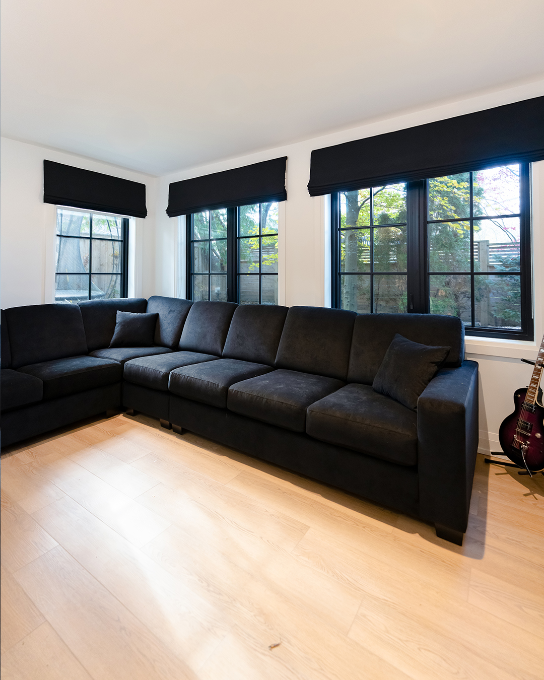 Interior view of garden suite with large window openings