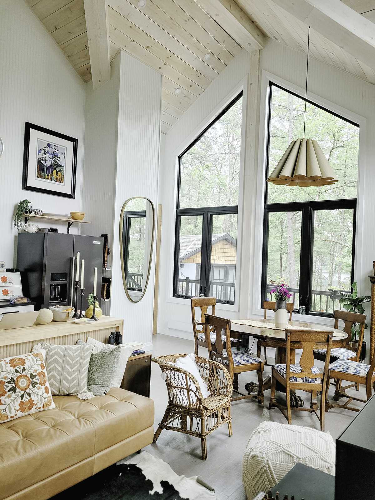 Muskoka cottage kitchen with black vinyl casement windows overlooking the surrounding trees.