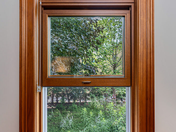 Interior view of a wood single-hung window with polygon transom in Markham home.
